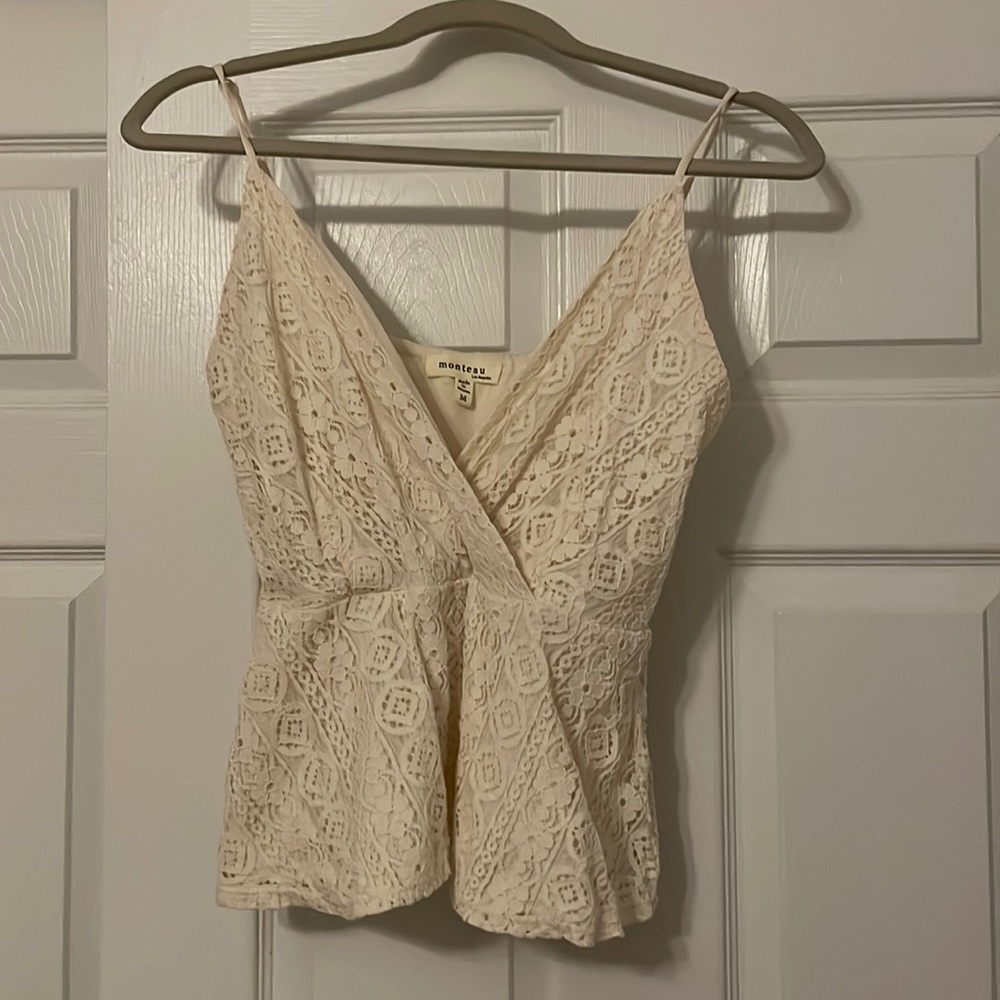 Lace tank top with adjustable straps. Size M